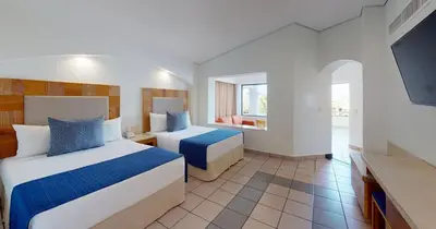 Cama o camas de una habitación en Park Royal Beach Huatulco - All Inclusive