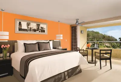 Cama o camas de una habitación en Dreams Huatulco Resort & Spa