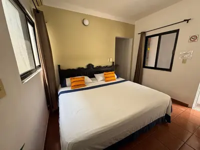 Cama o camas de una habitación en Hotel Casa Zoque Colonial