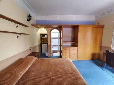 Cama o camas de una habitación en Villa Alfonsina