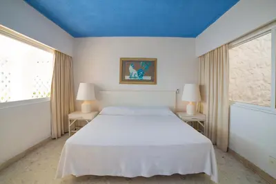 Cama o camas de una habitación en Exclusiva Villa frente al Mar en Playa Pichilingue, Acapulco