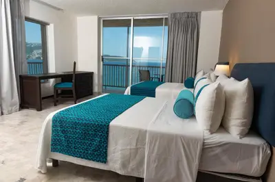 Cama o camas de una habitación en Ritz Acapulco All Inclusive