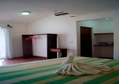 Cama o camas de una habitación en La Vivienda Villa
