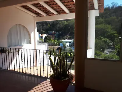 Un balcón o terraza de La Vivienda Villa
