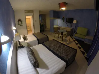 Cama o camas de una habitación en Hotel Club del Sol Acapulco by NG Hoteles