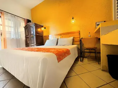 Cama o camas de una habitación en Hotel Escalada