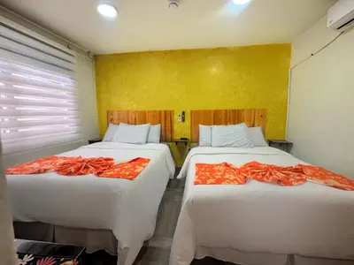 Cama o camas de una habitación en Hotel Escalada
