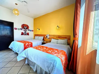 Cama o camas de una habitación en Hotel Escalada