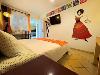 Cama o camas de una habitación en Hotel Escalada