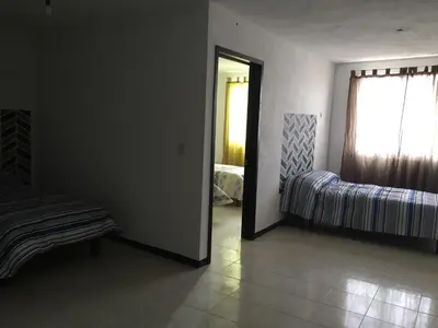 Cama o camas de una habitación en Hotelito Ejido