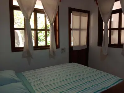 Cama o camas de una habitación en Hotel Papaya Surf