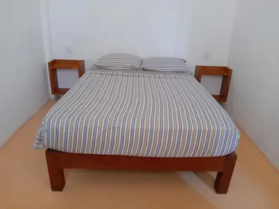 Cama o camas de una habitación en Hotel Papaya Surf