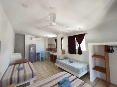 Cama o camas de una habitación en Hotel Papaya Surf