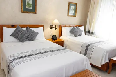 Cama o camas de una habitación en Hotel Marques Del Valle