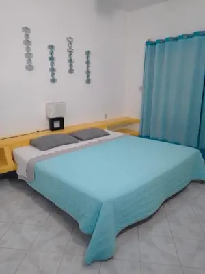 Cama o camas de una habitación en Residencia Jacarandas