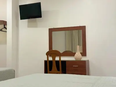 Una televisión o centro de entretenimiento en Casa Mayahuel