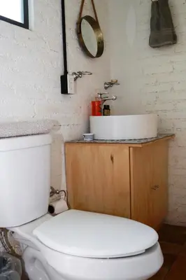 Un baño de Coyoacan City Lofts