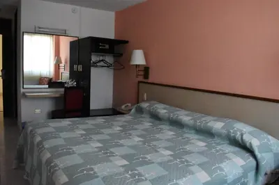 Cama o camas de una habitación en Hotel Baluarte