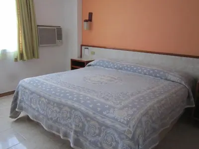 Cama o camas de una habitación en Hotel Baluarte