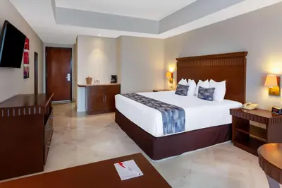 Cama o camas de una habitación en Ramada Plaza by Wyndham Veracruz Boca del Rio