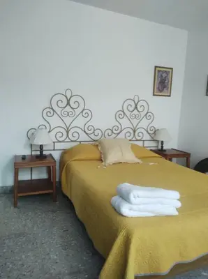 Cama o camas de una habitación en Gal - Habitaciones Confortables