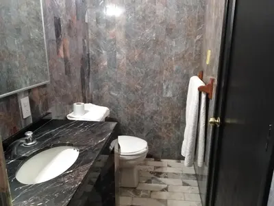 Un baño de Gal - Habitaciones Confortables