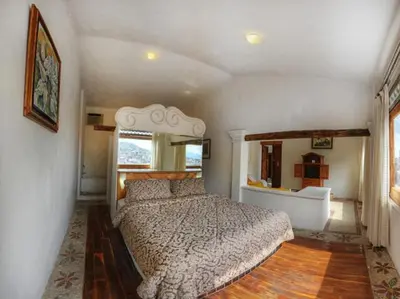 Cama o camas de una habitación en Posada de la Mision, Hotel Museo y Jardin