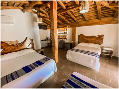 Cama o camas de una habitación en Casa Paraiso Hotel Boutique