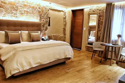 Cama o camas de una habitación en Cartesiano Boutique & Wellness Hotel