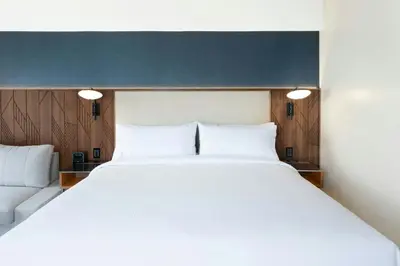 Cama o camas de una habitación en Courtyard by Marriott Puebla Las Animas