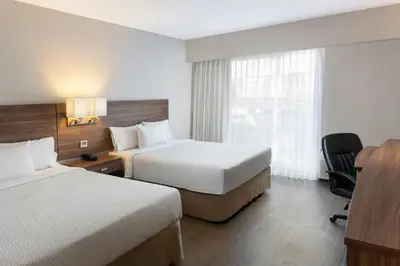 Cama o camas de una habitación en Courtyard by Marriott Puebla Las Animas