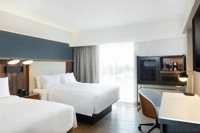 Cama o camas de una habitación en Courtyard by Marriott Puebla Las Animas