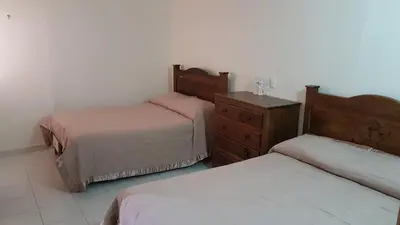 Cama o camas de una habitación en Hotel San Jose