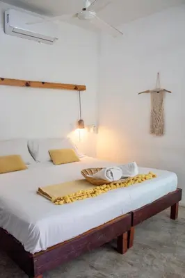 Cama o camas de una habitación en Casa Daikiri Hostel & Suites