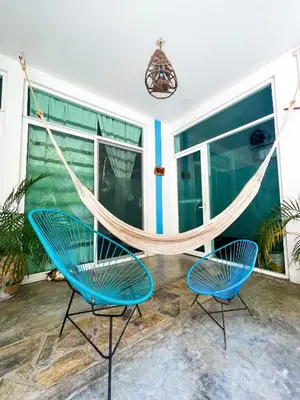 Un patio o zona al aire libre en Casa Daikiri Hostel & Suites