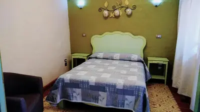 Cama o camas de una habitación en Posada Antiguo Camino Real