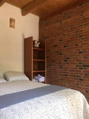 Cama o camas de una habitación en Refugio en el bosque de agua en Cuernavaca
