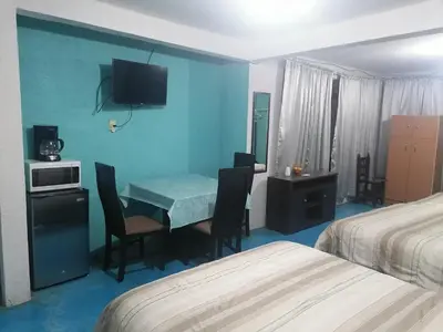 Cama o camas de una habitación en Hospedaje La Cienega