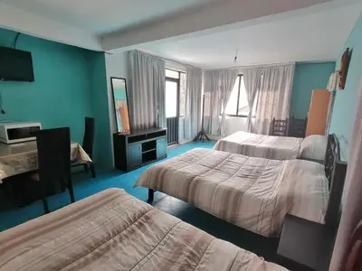 Cama o camas de una habitación en Hospedaje La Cienega