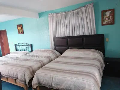 Cama o camas de una habitación en Hospedaje La Cienega