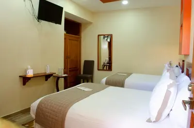 Cama o camas de una habitación en Hotel Casa Franco