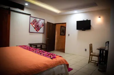 Cama o camas de una habitación en Posada de la Virgen