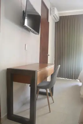 Cama o camas de una habitación en Acapulco Amor