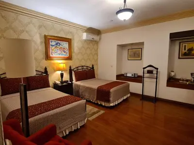 Cama o camas de una habitación en Hotel Casa Divina Oaxaca