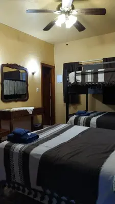 Cama o camas de una habitación en Posada Los Chaneques Catemaco