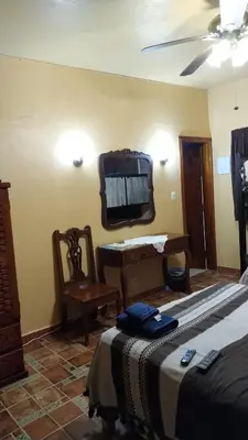 Cama o camas de una habitación en Posada Los Chaneques Catemaco