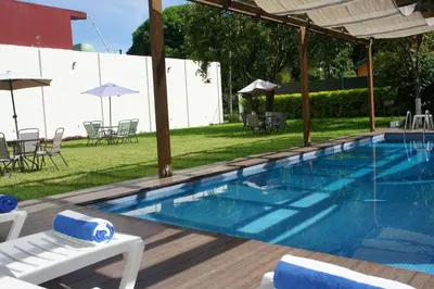 Piscina en o cerca de Relax Inn Suites