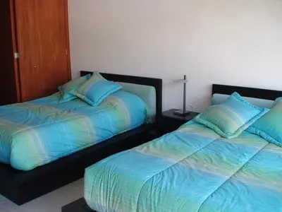 Cama o camas de una habitación en Departamento de Lujo