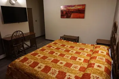 Cama o camas de una habitación en Hotel Plaza Crystal