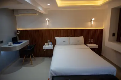Cama o camas de una habitación en Hotel Atenas